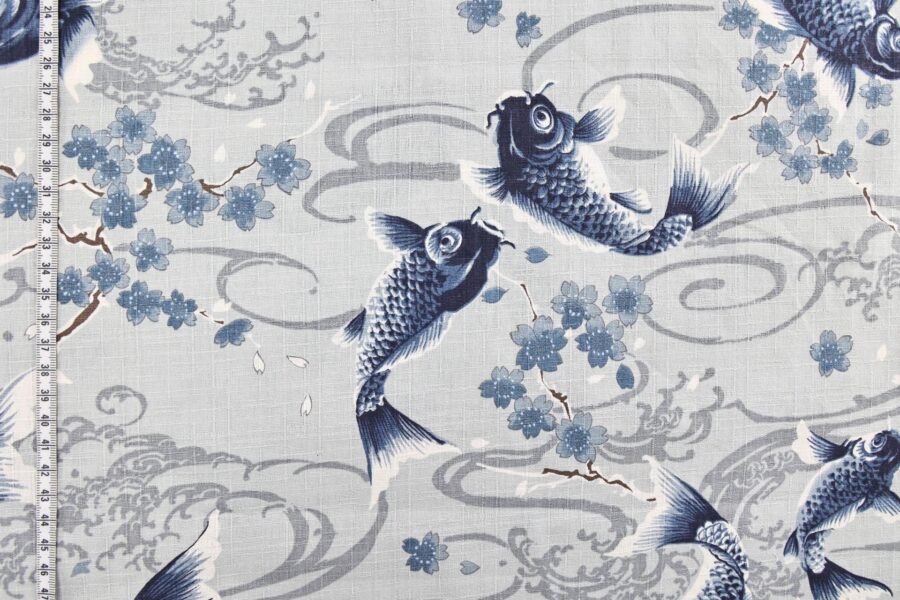 Japanese fabric carps with Sakura on grey background