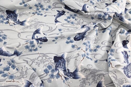 Japanese fabric carps with Sakura on grey background