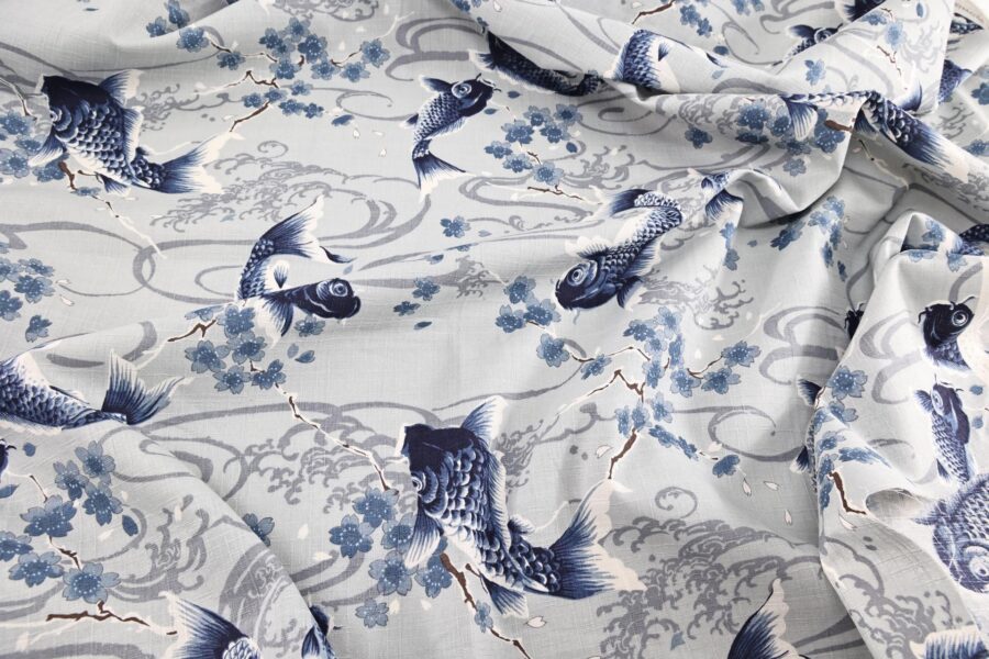 Japanese fabric carps with Sakura on grey background