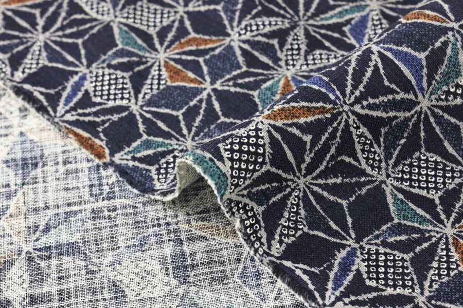 Ecru multicolored Asanoha fabric navy blue background
