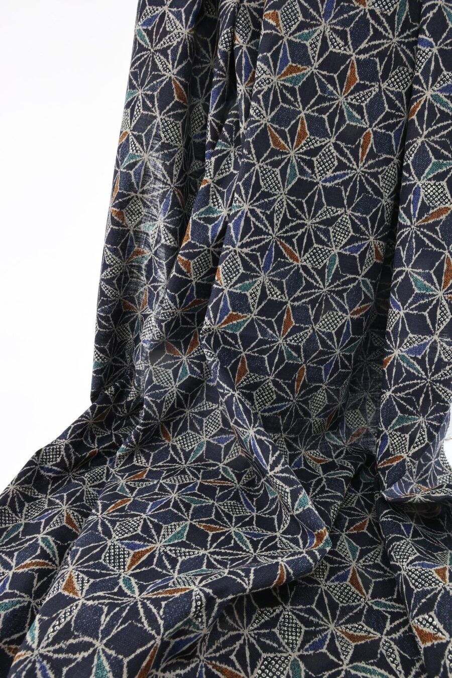 Ecru multicolored Asanoha fabric navy blue background
