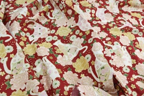 Japanese fabric cats peonies and fans red background