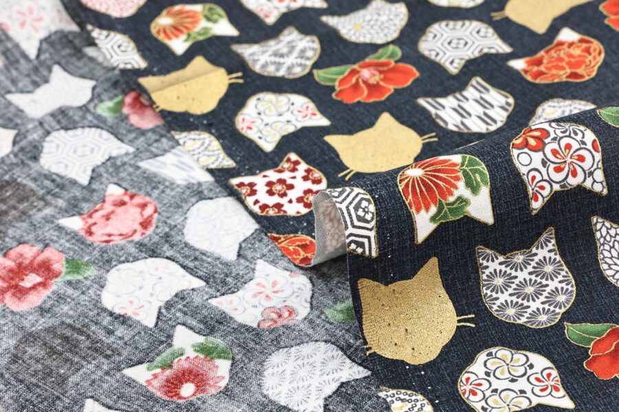 Japanese fabric with cat heads black background