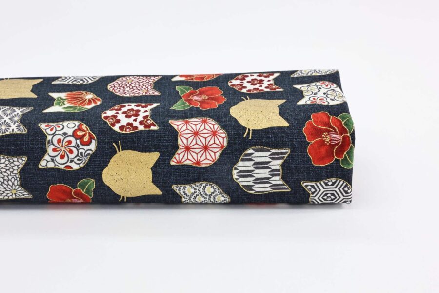 Japanese fabric with cat heads black background