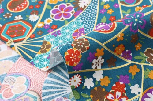Japanese fabric butterfly Ougi and flowers on teal blue