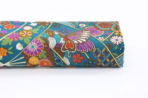 Japanese fabric butterfly Ougi and flowers on teal blue