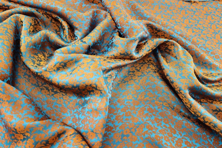 Brocade fabric apricot flowers bronze and teal blue