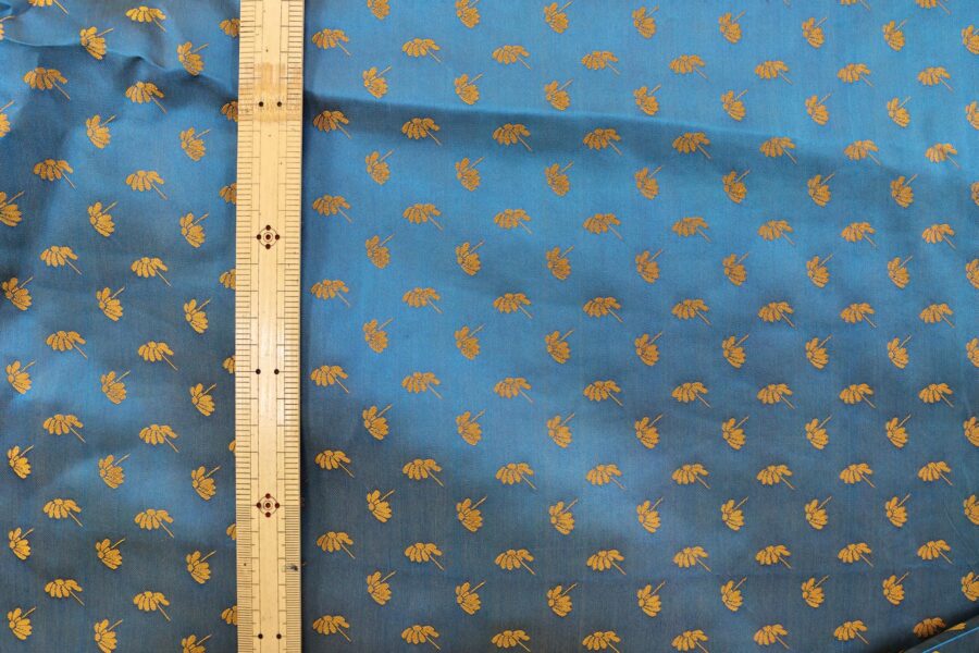 Brocade fabric with small flowers in bronze color