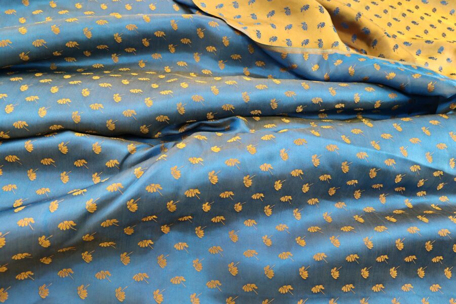 Brocade fabric with small flowers in bronze color