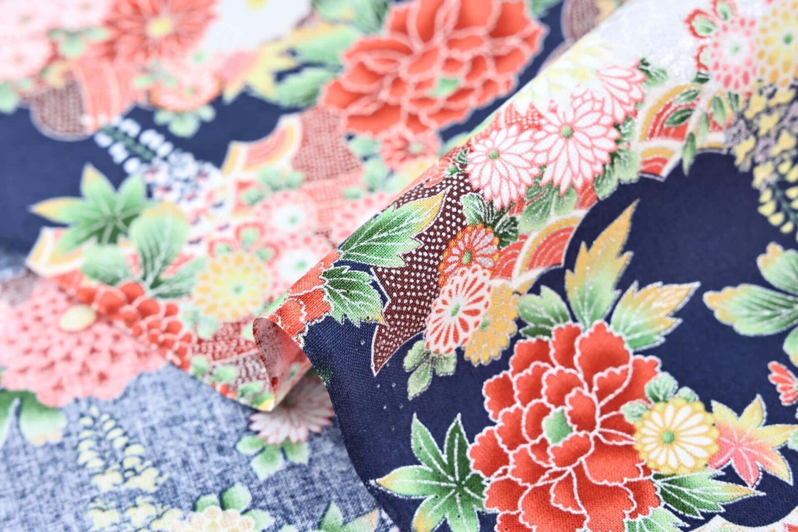 Silver flowers Japanese fabric on blue background