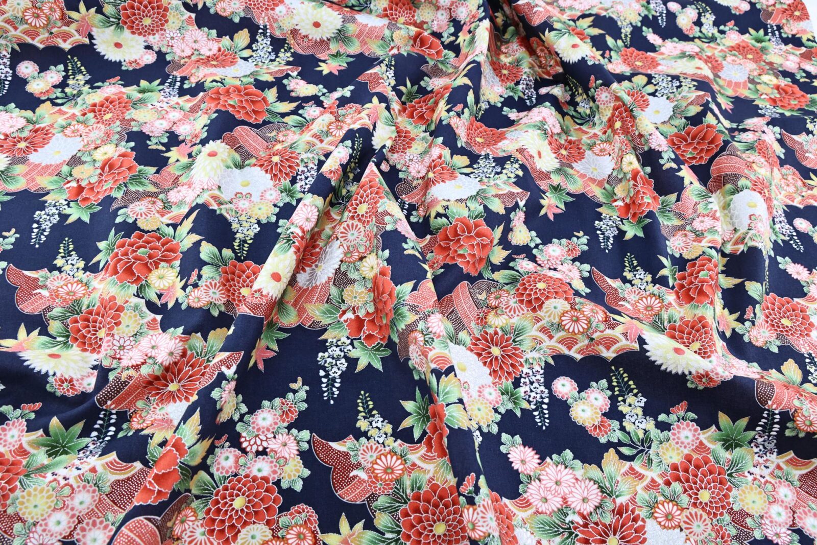 Silver flowers Japanese fabric on blue background