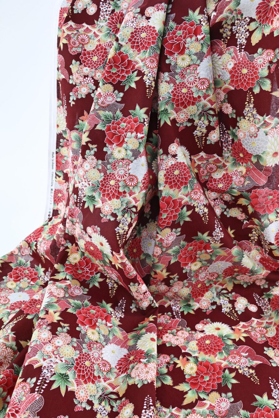 Silver flowers Japanese fabric on red background