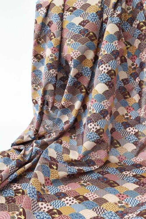 Fabric waves multi-patterned in blue, brown, and orange