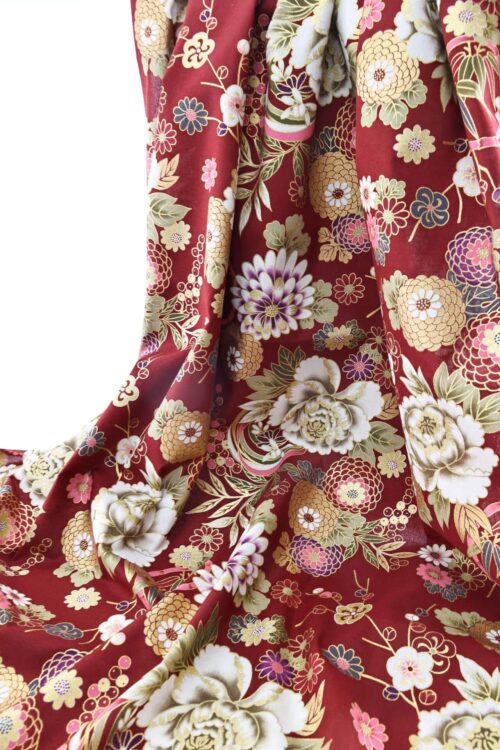 Golden flowers Japanese fabric on red background