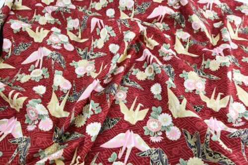 Japanese fabric origami cranes Sayagata red Background