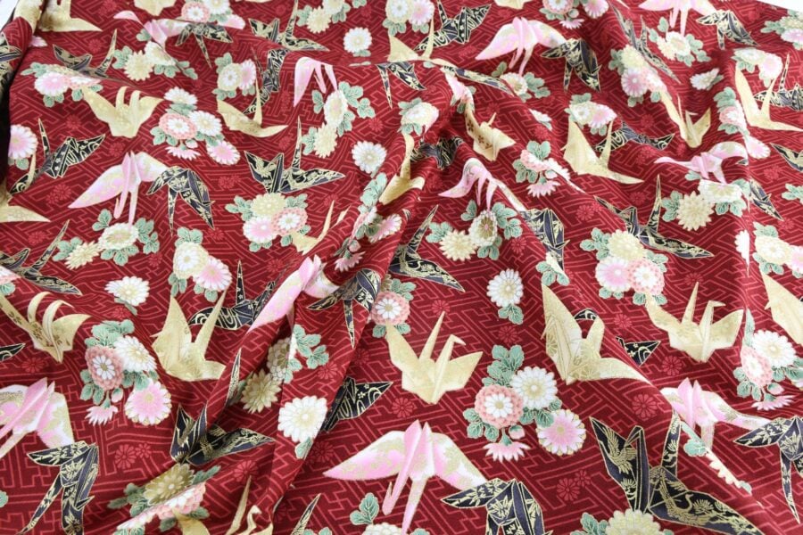 Japanese fabric origami cranes Sayagata red Background