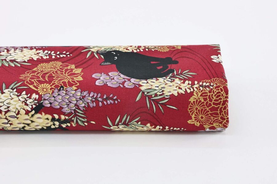 Black cat and Fuji flower fabric red background