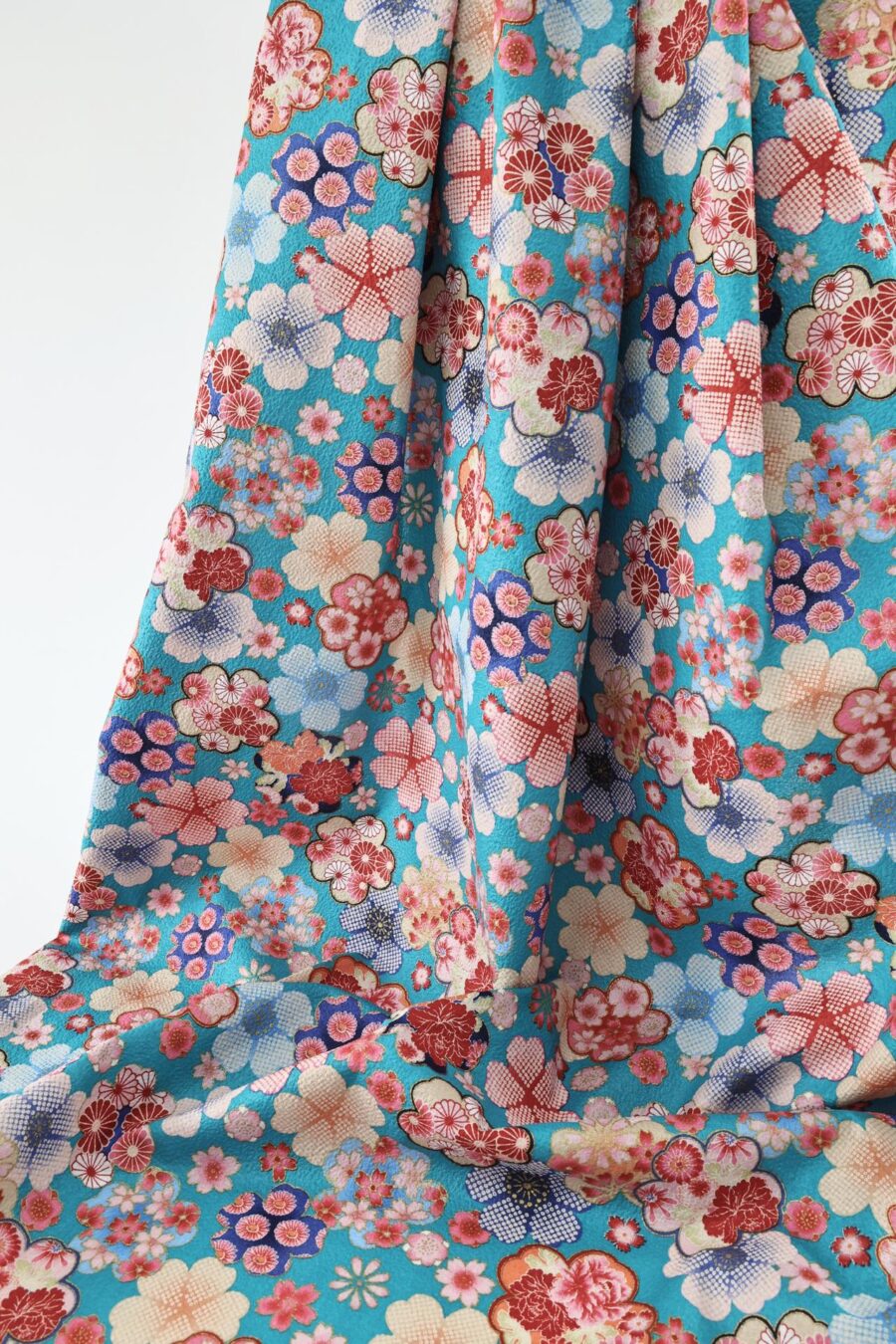 Japanese crinkled fabric Ume on blue