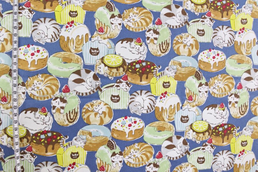 Oxford fabric cats pastries blue background