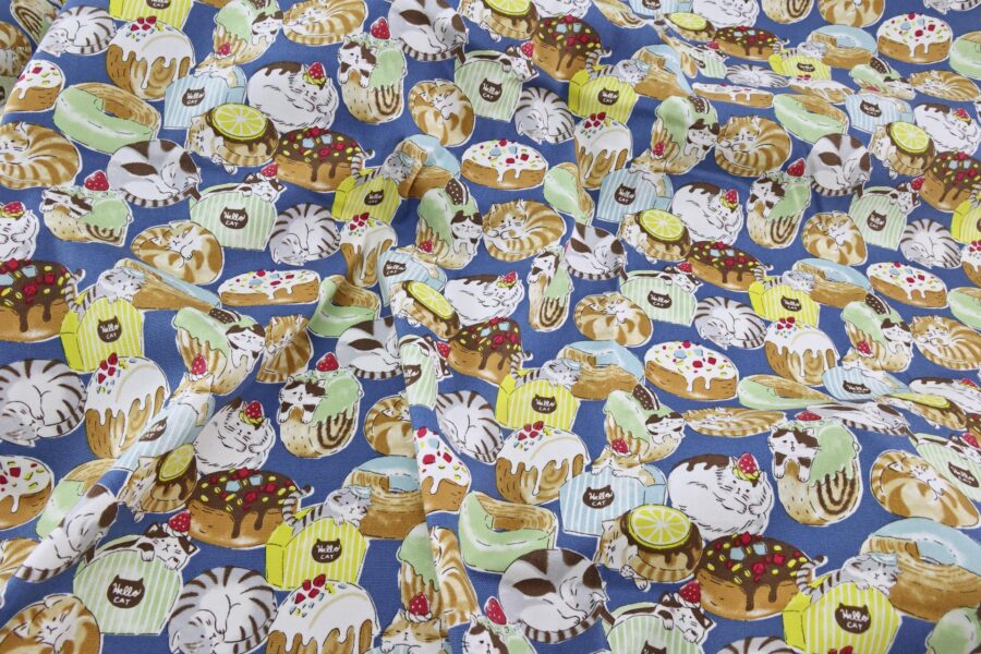 Oxford fabric cats pastries blue background