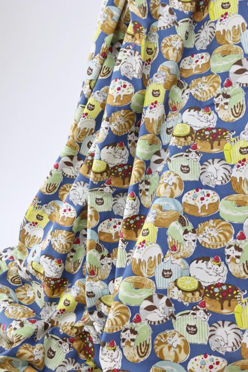 Oxford fabric cats pastries blue background