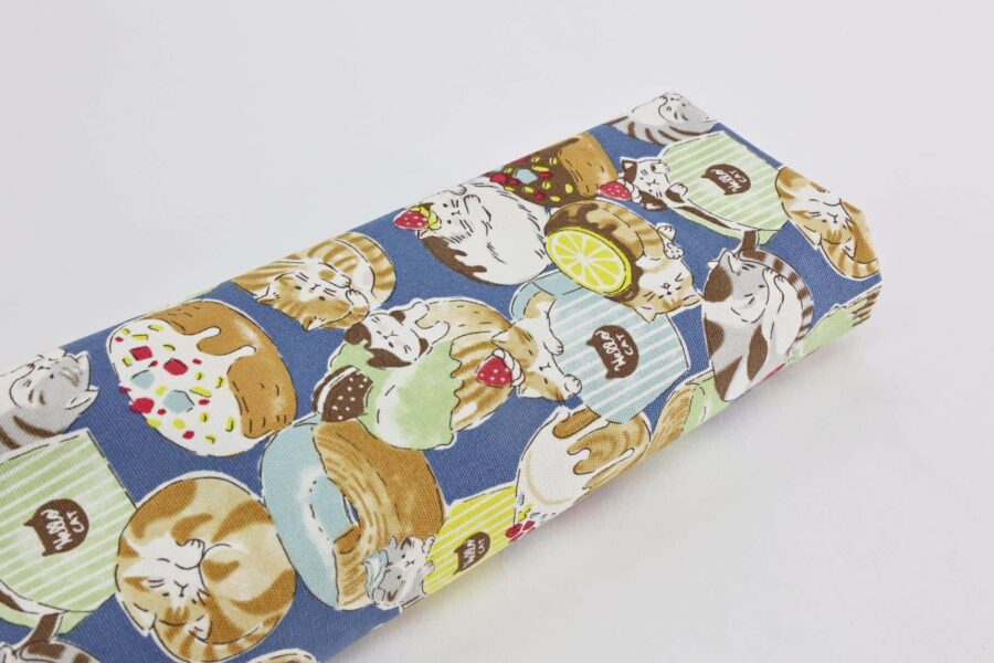 Oxford fabric cats pastries blue background