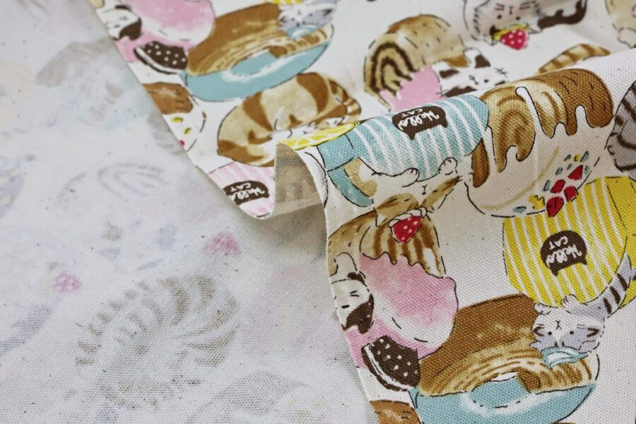 Oxford fabric cats pastries white background