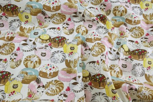 Oxford fabric cats pastries white background