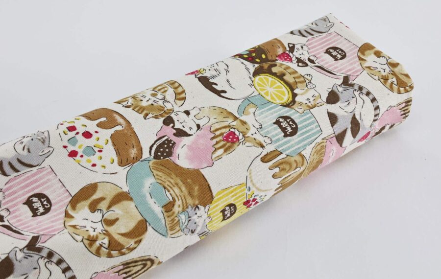 Oxford fabric cats pastries white background