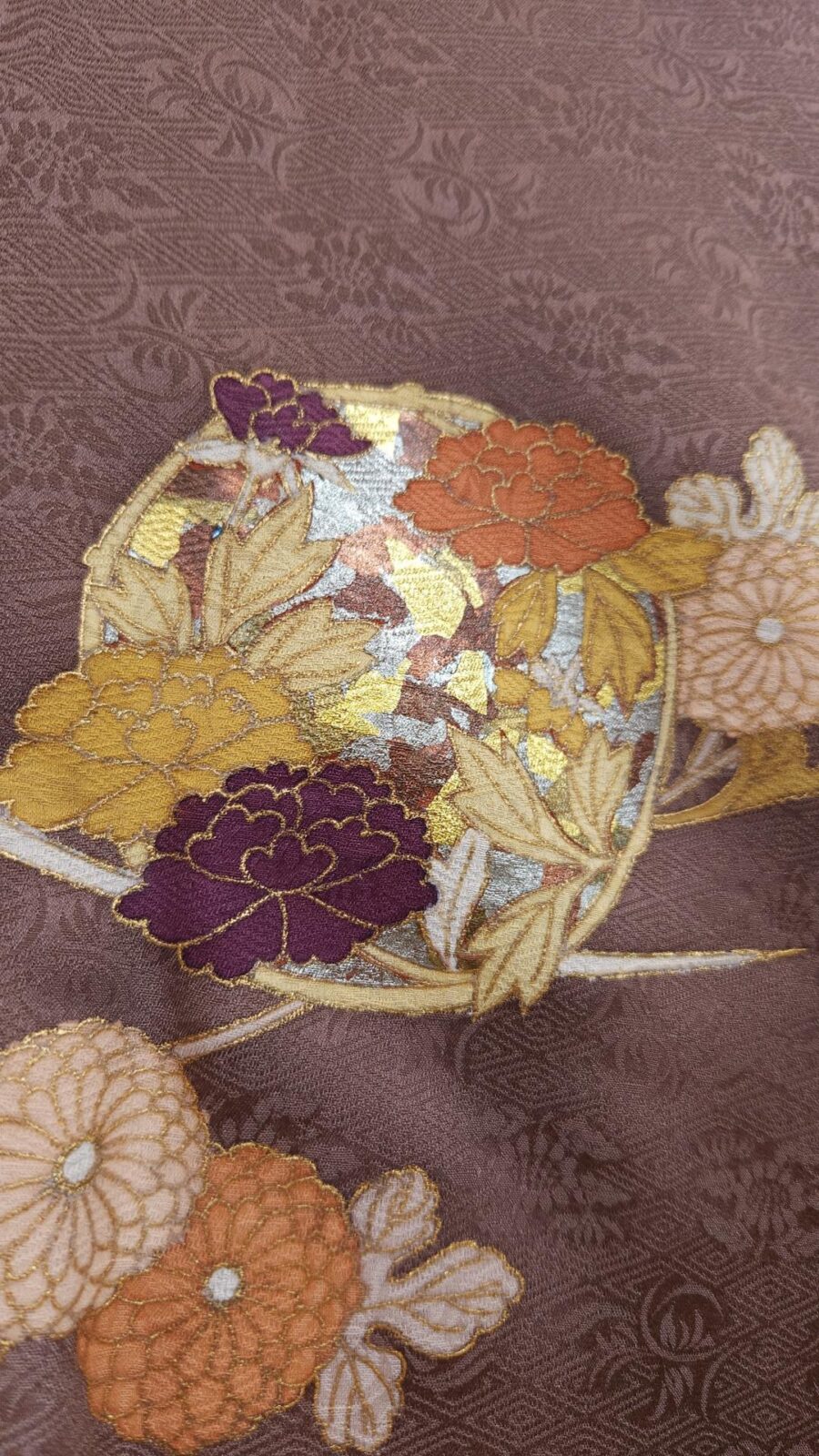 Houmongi in mauve brocade with flowers
