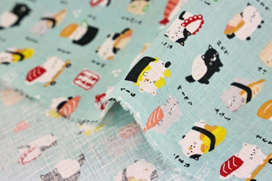 Japanese kawaii Sushi Neko fabric turquoise background