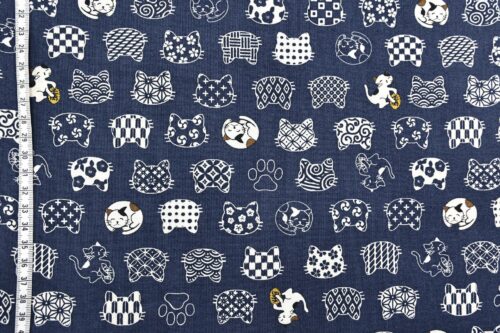 Japanese fabric cat faces graphic patterns blue background