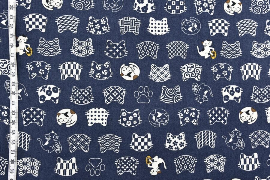 Japanese fabric cat faces graphic patterns blue background