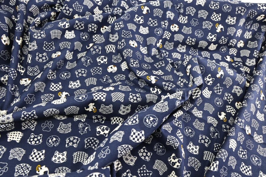 Japanese fabric cat faces graphic patterns blue background