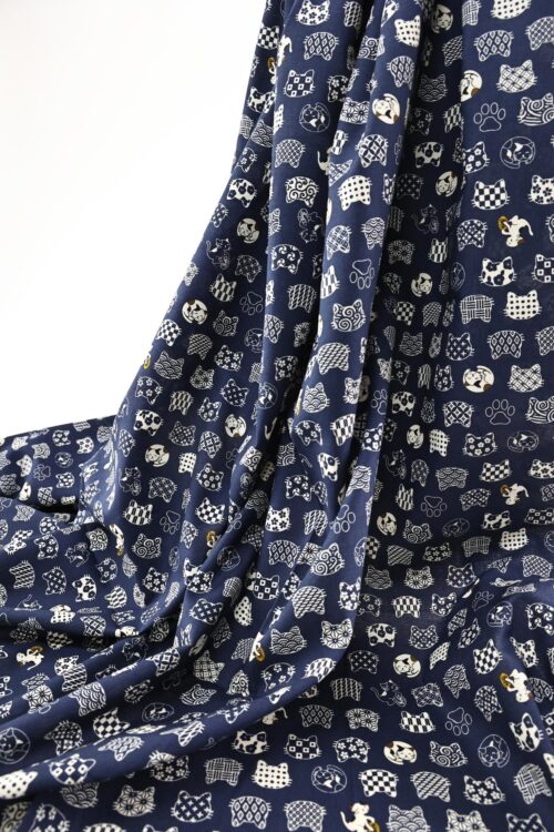 Japanese fabric cat faces graphic patterns blue background