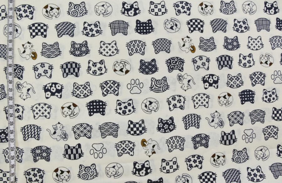 Japanese fabric cat faces graphic patterns ivory background