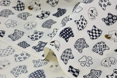 Japanese fabric cat faces graphic patterns ivory background