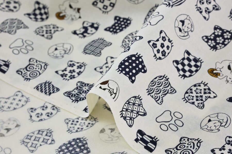Japanese fabric cat faces graphic patterns ivory background