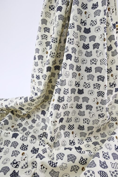 Japanese fabric cat faces graphic patterns ivory background