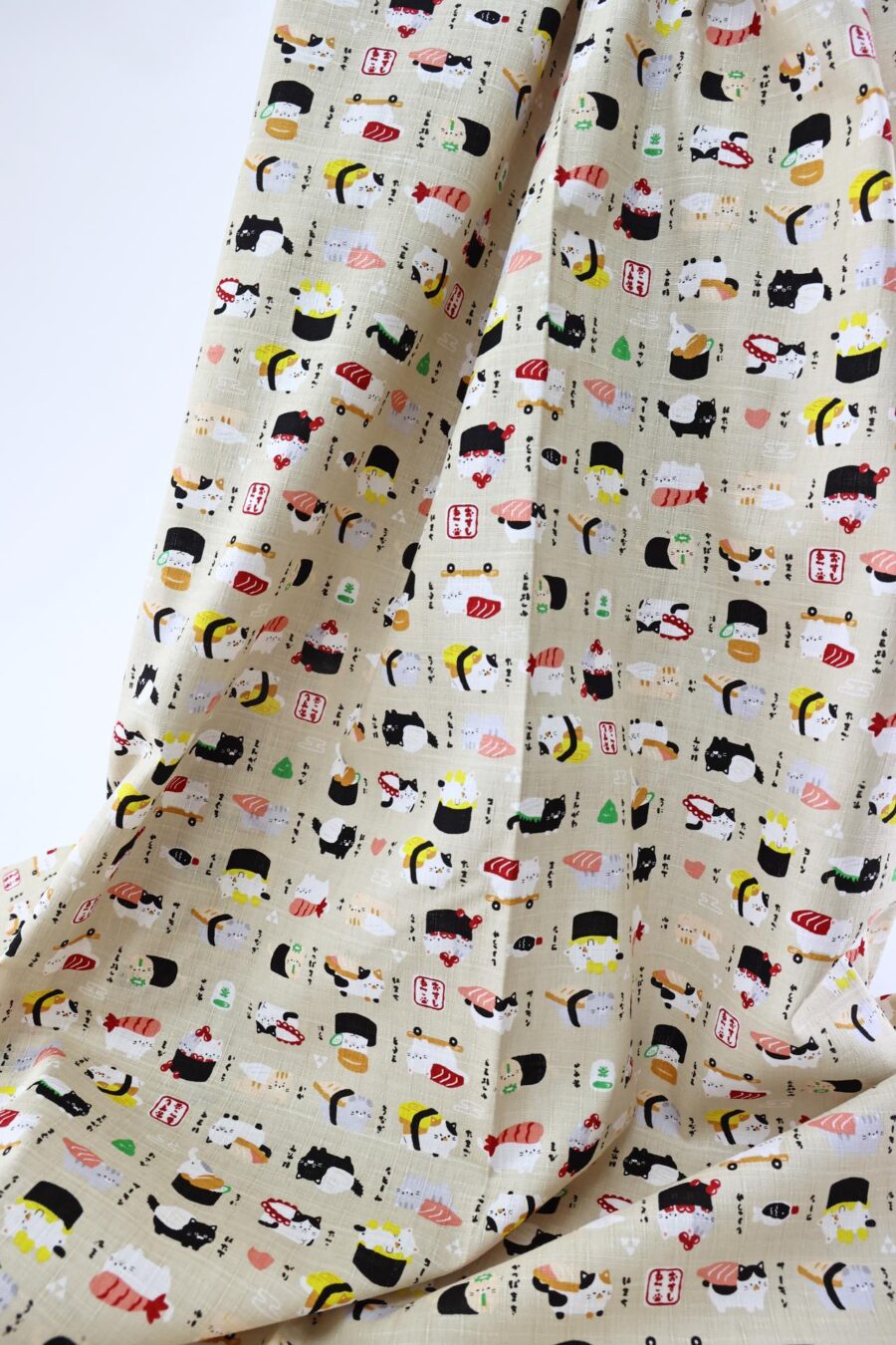 Japanese kawaii Sushi Neko fabric cream background