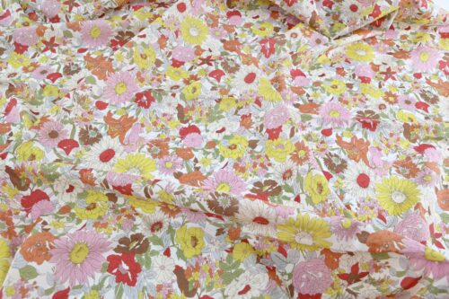 Liberty style pink and yellow colored lawn fabric