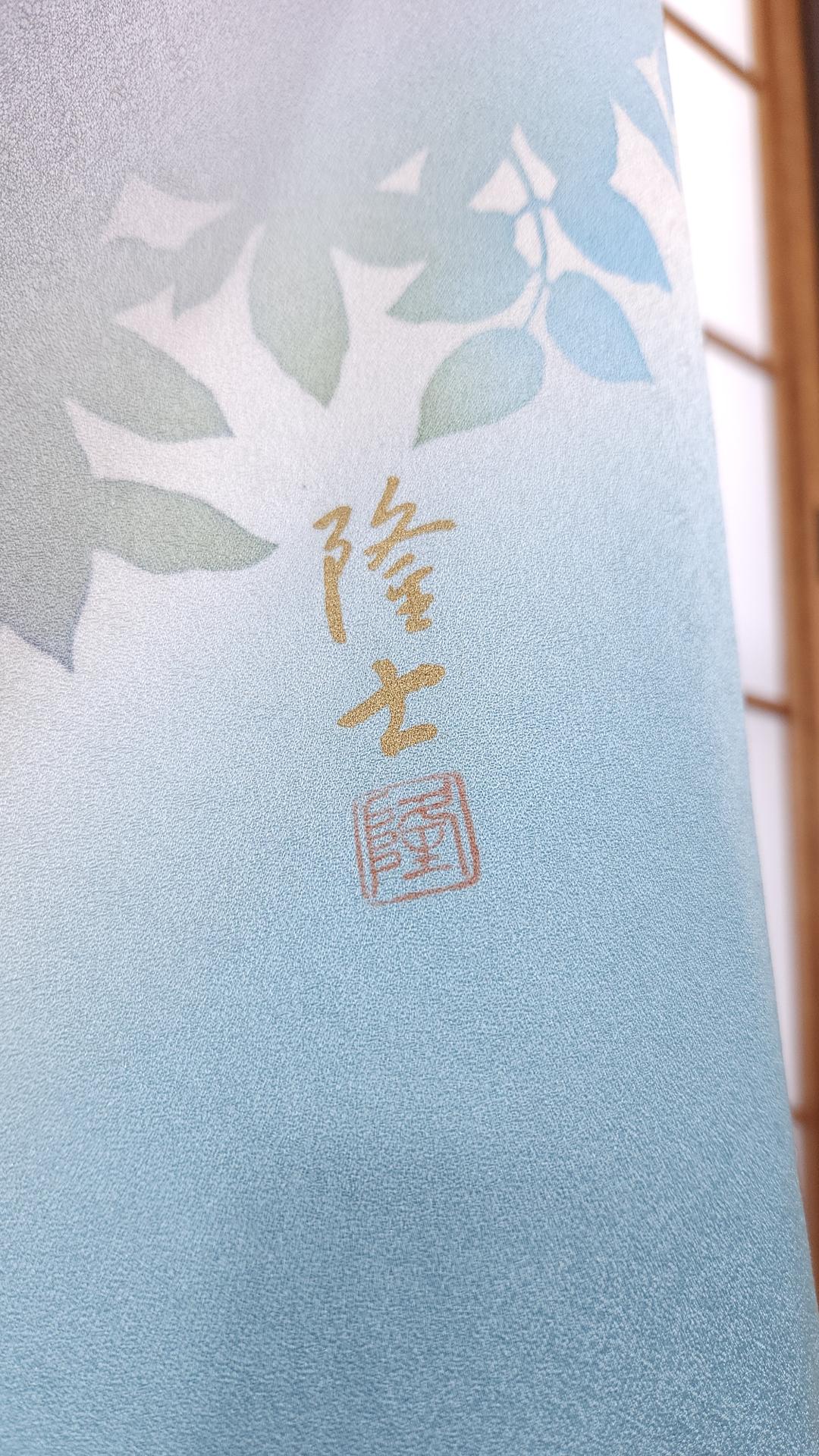 Light blue houmongi with pearlescent flowers