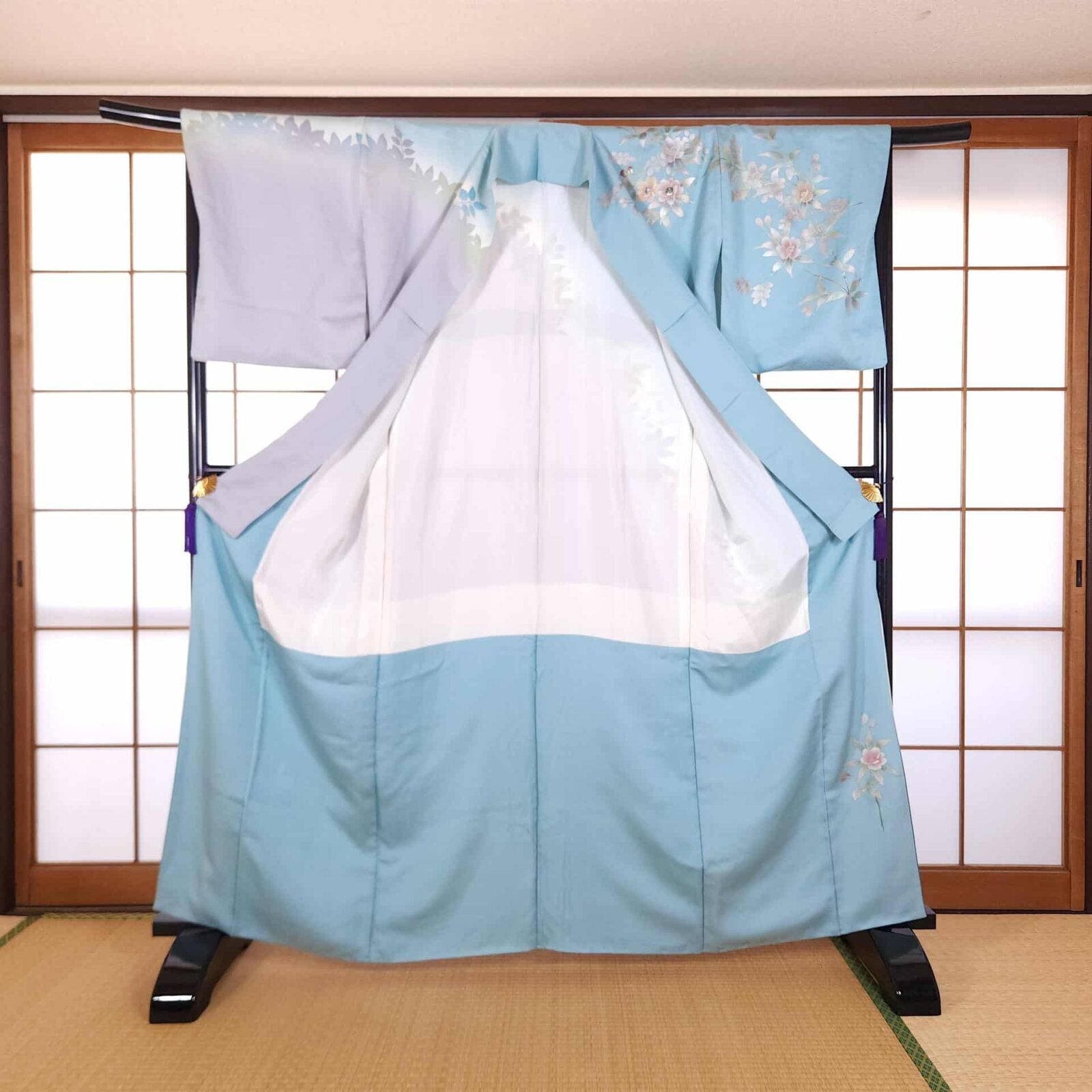 Light blue houmongi with pearlescent flowers