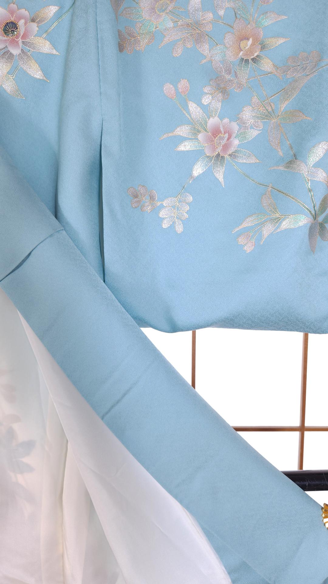 Light blue houmongi with pearlescent flowers