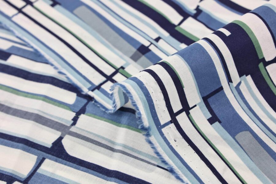 Organic lawn cotton with graphic blue patterns
