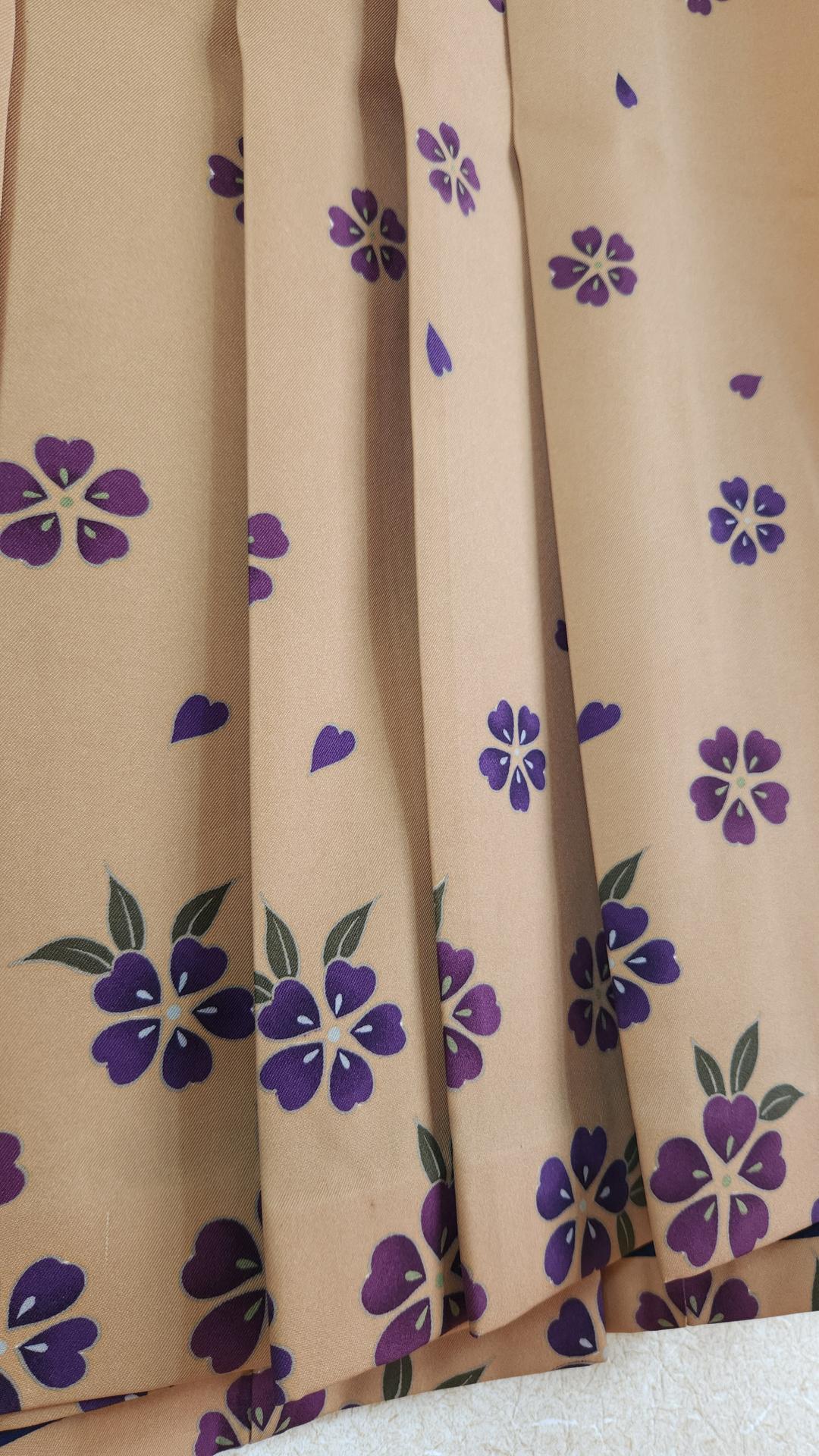 Beige hakama with purple sakura pattern