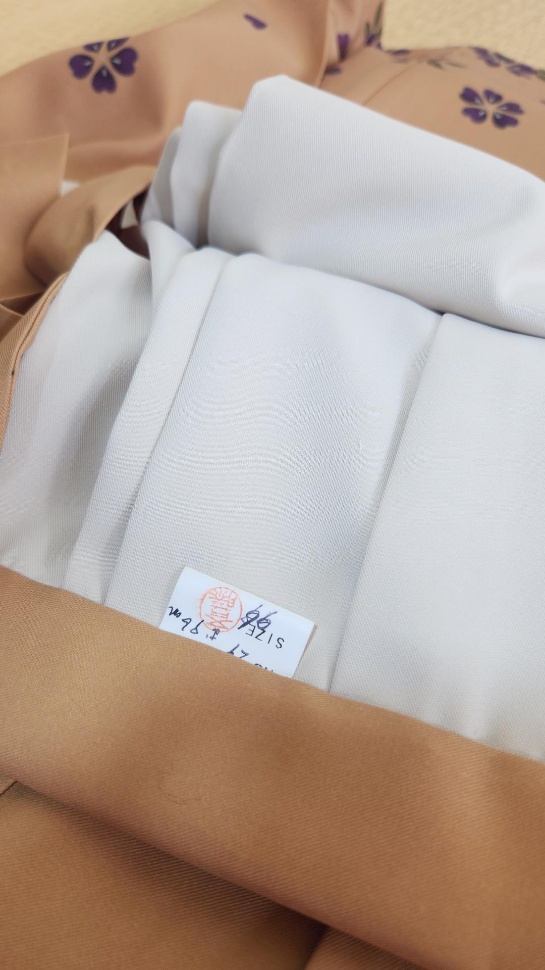 Beige hakama with purple sakura pattern