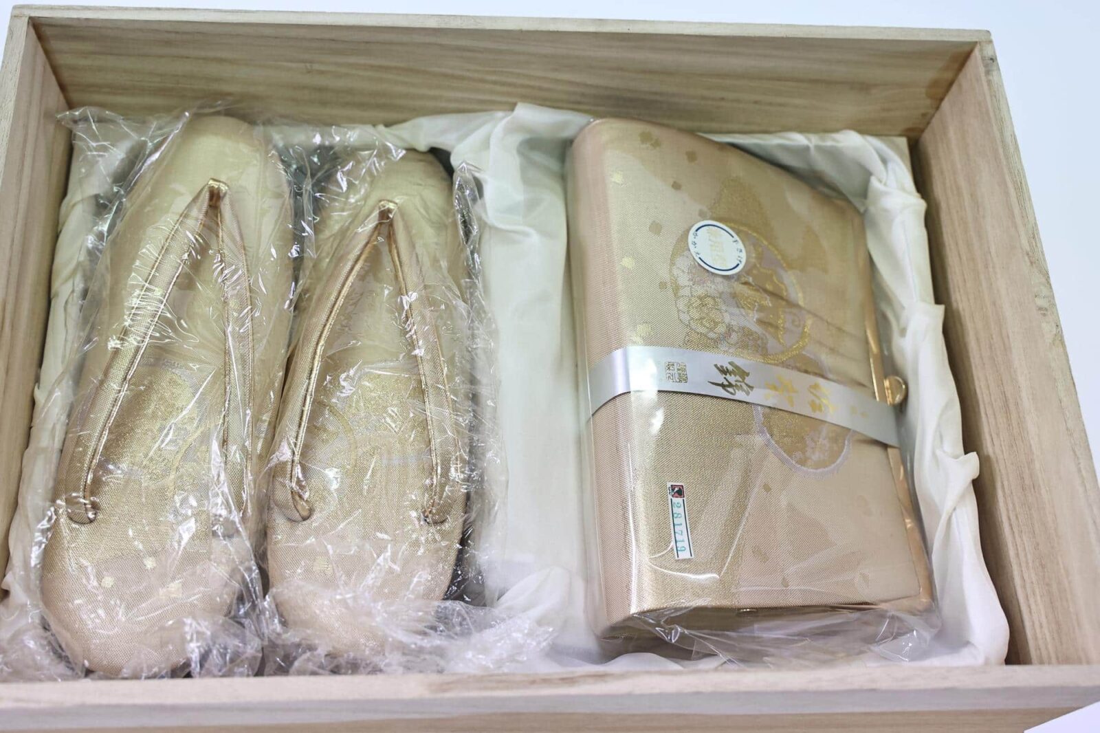 Gold Zori and clutch with their box