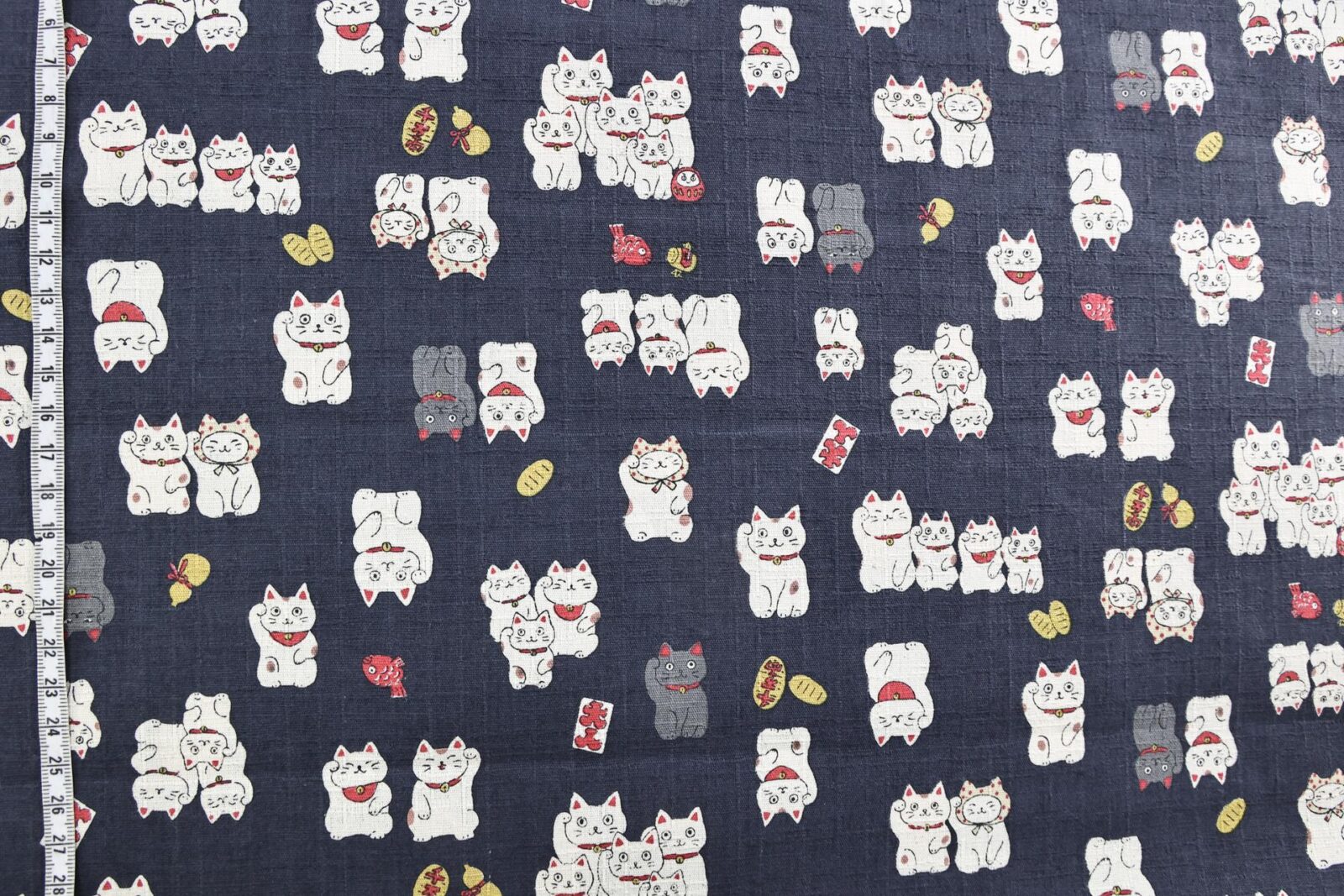 Japanese Maneki Neko dobby cotton fabric – blue background