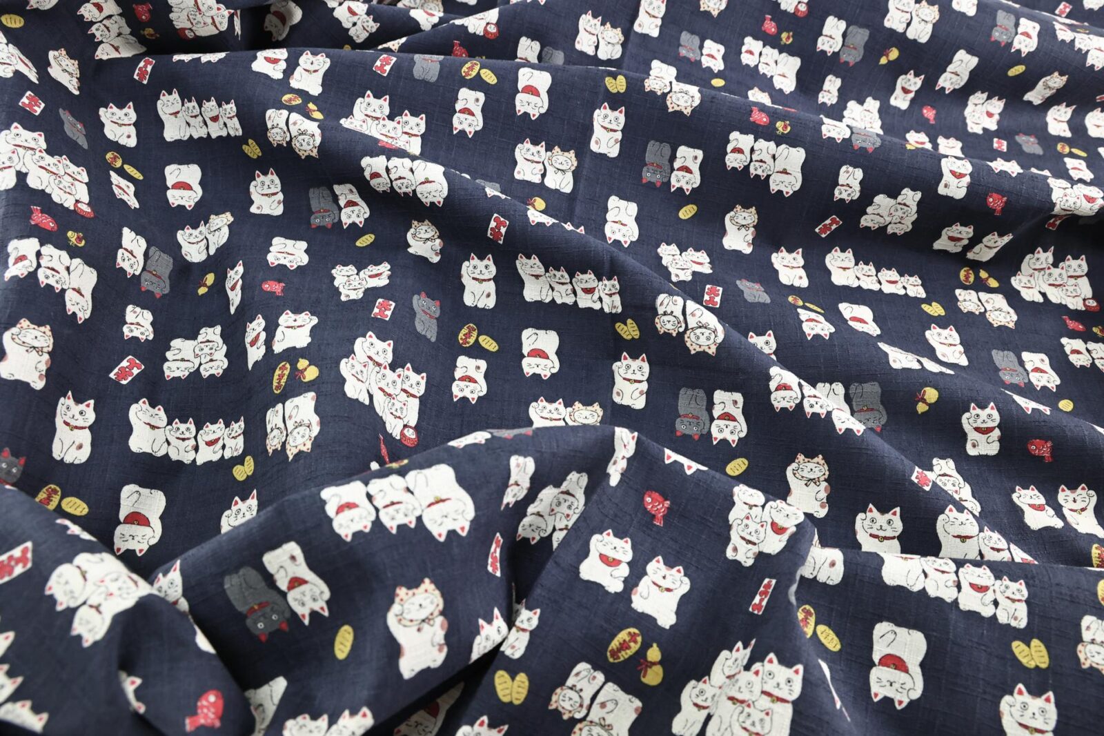 Japanese Maneki Neko dobby cotton fabric – blue background